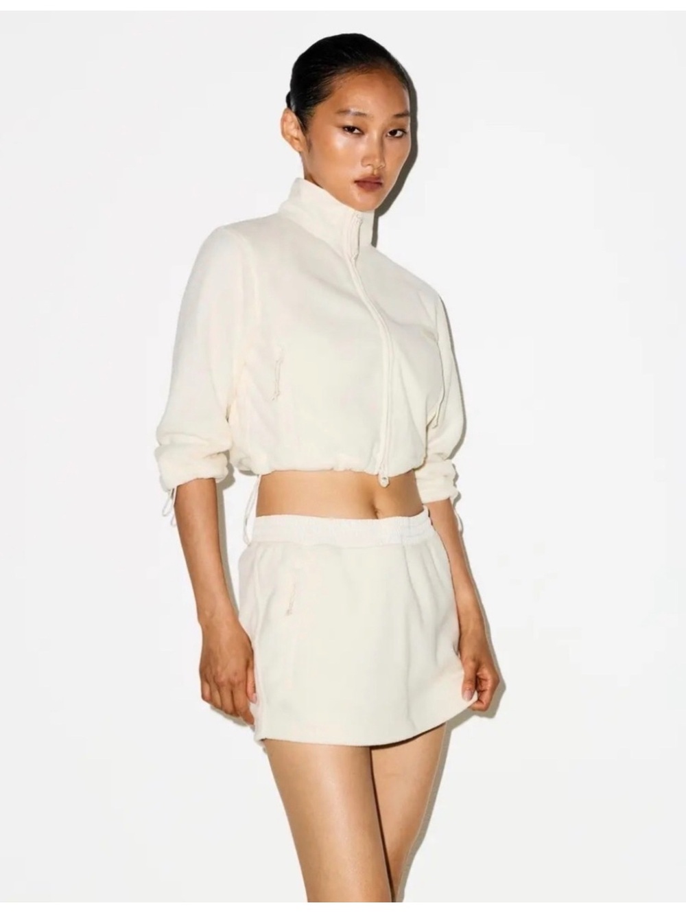 SKIMS Cream Fleece Mini Skirt Size Small Zip Pockets Drawstring Waist